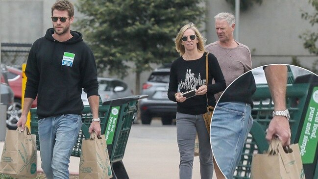 A photo from almost two months ago showing Liam Hemsworth shopping with his parents without his wedding ring. Picture: NGRE / BACKGRID