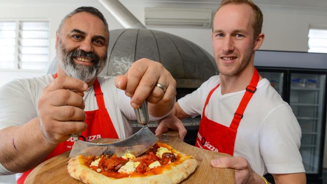 Rocco DeAngelis and Janis Luks of RoccoPizza have banned even mentioning ham and pineapple pizza Photo: AAP Image/Brenton Edwards