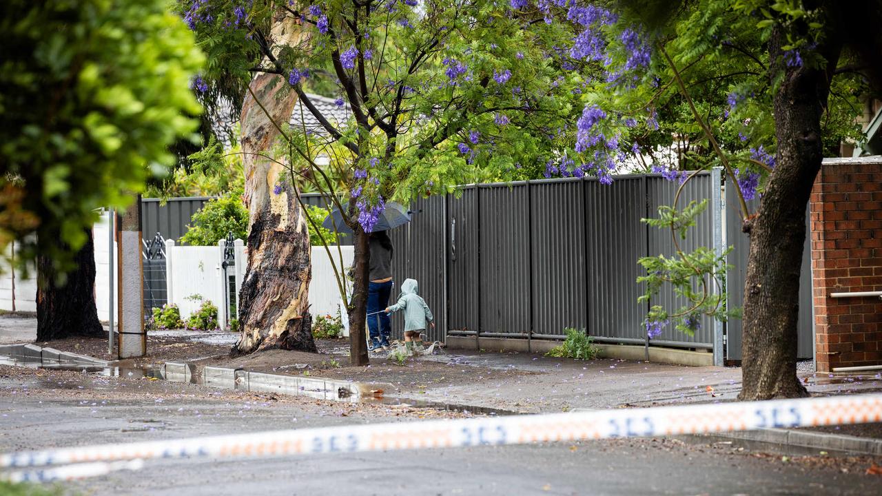 Locals walking in Wayville after flooded due to severe weather conditions. Picture: NCA NewsWIRE / Emma Brasier