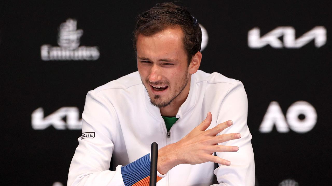 Russia's Daniil Medvedev speaks at the press conference after the men's singles final match against Spain's Rafael Nadal on day fourteen of the Australian Open tennis tournament in Melbourne on January 31, 2022. (Photo by Martin KEEP / AFP) / -- IMAGE RESTRICTED TO EDITORIAL USE - STRICTLY NO COMMERCIAL USE --