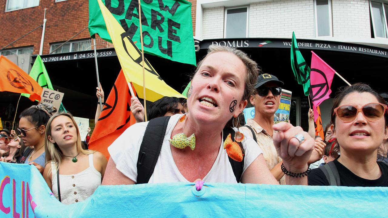 Protesters yell as some are arrested by police on Monday. Picture: Lisa Maree Williams/Getty Images