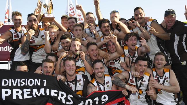 Craigieburn celebrates last season’s Division 1 flag. Picture: Andy Brownbill