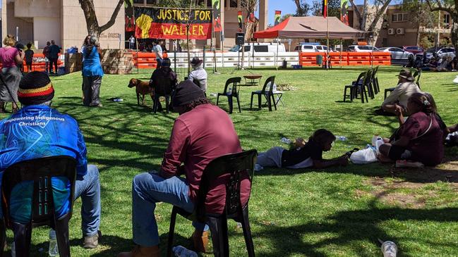 Relatives of teenager Kumanjayi Walker gather outside the Alice Springs Local Court on Tuesday. Picture: Jason Walls