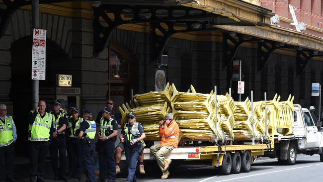 Restoration worker on standby. Picture: Nicole Garmston