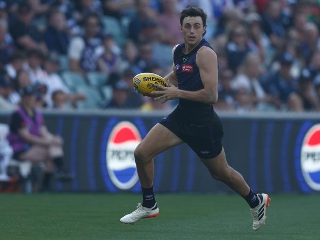 ADELAIDE, AUSTRALIA – APRIL 06: Jordan Clark of the Dockers in action during the 2024 AFL Round 04 match between the Fremantle Dockers and the Carlton Blues at Adelaide Oval on April 06, 2024 in Adelaide, Australia. (Photo by Michael Willson/AFL Photos via Getty Images)