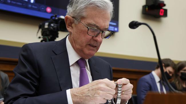 Federal Reserve Board chairman Jerome Powell checks his watch during a hearing before house financial services committee on Capitol Hill last week. Picture: Getty Images / AFP