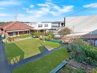 Humble red brick house sells for price of mansion