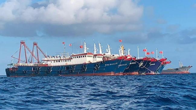 Chinese vessels anchored at Whitsun Reef, 320km west of Palawan Island in the South China Sea, last month in what was viewed as an act of aggression. Picture: Philippine Communications Operations Office