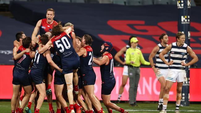 GEELONG, AUSTRALIA – AUGUST 21, 2021: The Demons celebrate after Max Gawn kicked a goal after the final siren to give the Demons a 4 point win over Geelong at the GMHBA Stadium, on August 20, 2021, in Geelong, Australia. (Photo by Michael Klein)