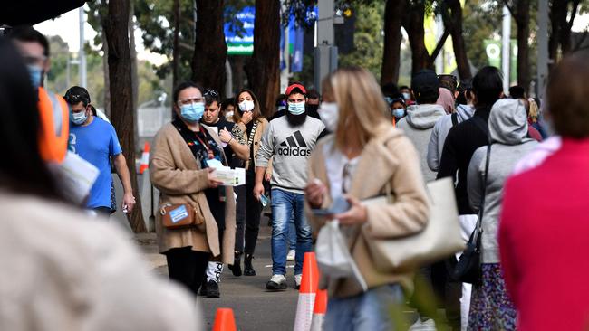 Queues outside one of Sydney’s mass vaccination clinics. Picture: AFP