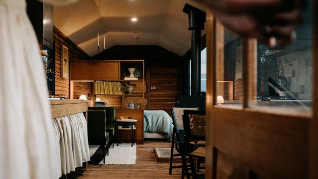 Inside the train carriage conversion. Picture: Robert Lang