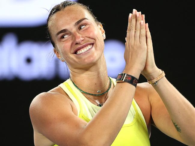 TOPSHOT - Belarus' Aryna Sabalenka celebrates a victory over Russiaâs Anastasia Pavlyuchenkova after her women's singles quarterfinal match on day ten of the Australian Open tennis tournament in Melbourne on January 21, 2025. (Photo by Martin KEEP / AFP) / -- IMAGE RESTRICTED TO EDITORIAL USE - STRICTLY NO COMMERCIAL USE --