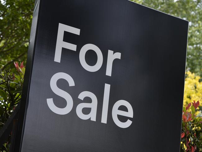 A real estate For Sale sign on a property in East Toowoomba, house for sale, Thursday, December 21, 2017.