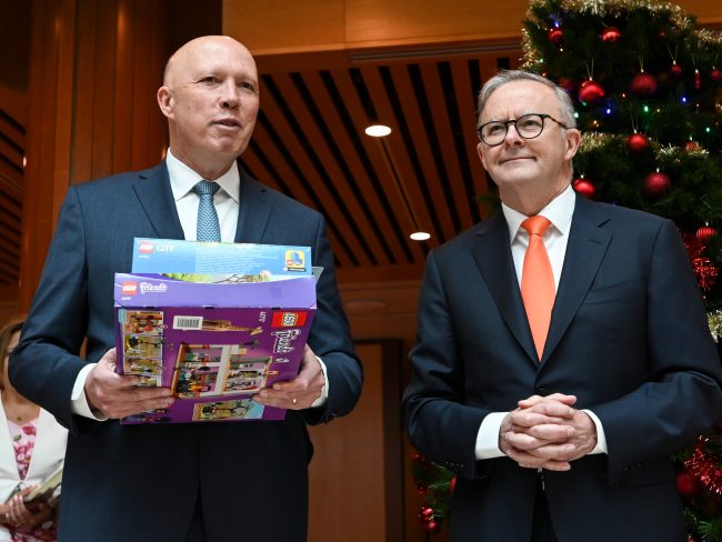 Prime Minister Anthony Albanese and Opposition Leader Peter Dutton join representatives from Salvation Army and Kmart to drop off Christmas presents at the Kmart wishing tree at Parliament House. Picture: NCA NewsWire / Martin Ollman