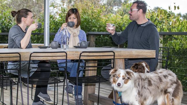 Customers enjoy a coffee on the outside deck. Picture: Sarah Matray