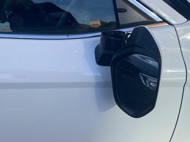 A 50-year-old man of no fixed address has been arrested for allegedly snapping the mirrors of nine cars at a car dealership in the city