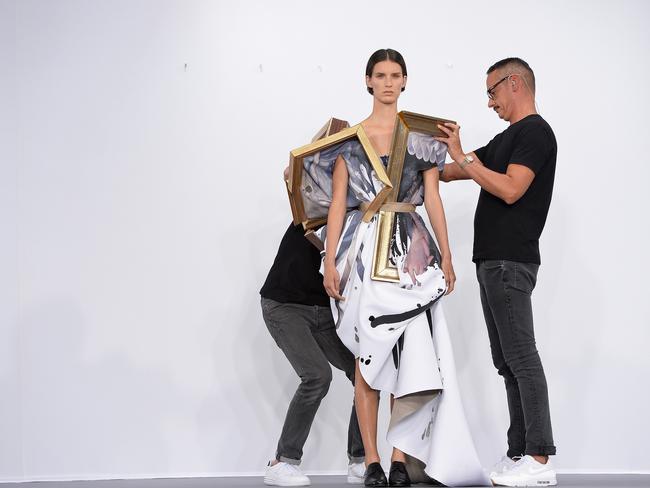 Viktor Horsting dresses a model with Rolf Snoeren as part of Paris Fashion Week Haute Couture Fall/Winter 2015/2016. Picture: Getty