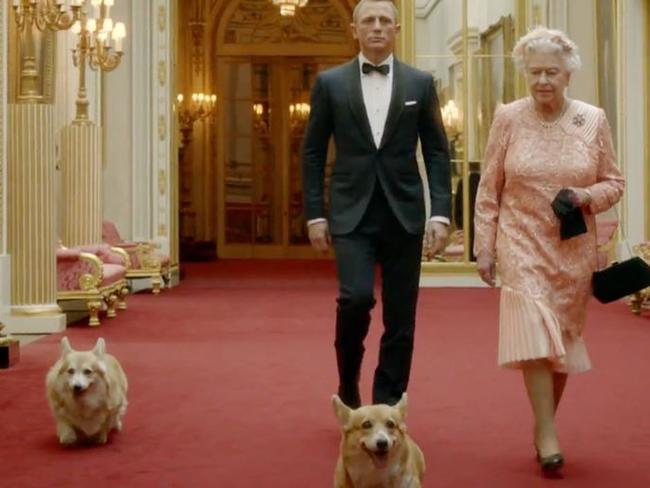 The Queen's corgis co-starred in her movie moment with Daniel Craig for the 2012 Olympics and the dress was designed specifically not to match the colour of other nations.