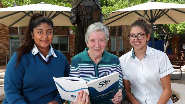 Sister Barbara McDonough with Catherine McAuley students Erika Serrano and Megan Barakat in 2017. Picture: Adam Ward