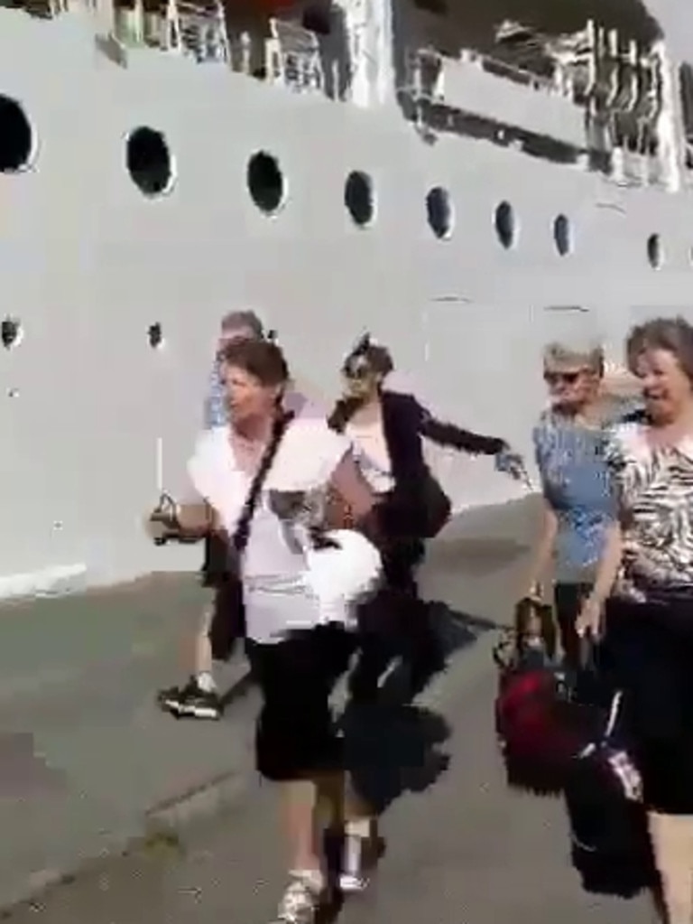 Tourists fleeing as the ship collides.