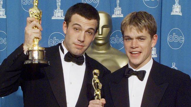 Matt Damon and Ben Affleck with their Oscars for Best Original Screenplay for Good Will Hunting at the 1998 Academy Awards. Picture AFP PHOTO