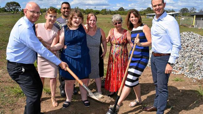 EXCITMENT: Member for Blair Shayne Neumann joins Empowered to Care representatives Jo-Anne Daley, Justyn Rowlinson (back), Kylie Hughes and Christine Saunders with future resident Bonnie Cox (centre), and 1Plus1 Property Pathways representatives Kevin and Megan Humphries. Picture: Andrew Korner