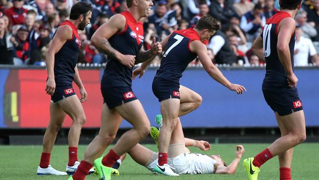 Jordan Lewis (far left) let the Dees down last week, writes Mick Malthouse. Picture: Wayne Ludbey