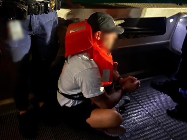 Authorities arrest fugitive Hussein Chamas and two other people aboard a yacht in the Arafura Sea, off the NT coast, on January 26, 2025. Picture: AFP