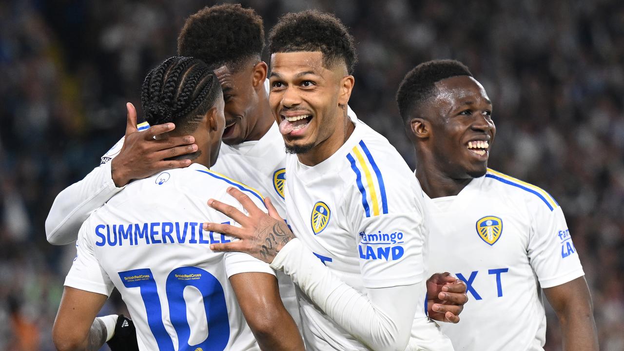 LEEDS, ENGLAND – MAY 16: Georginio Rutter of Leeds United celebrates after Crysencio Summerville of Leeds United (obscured) scores his team's fourth goal during the Sky Bet Championship Play-Off Semi-Final 2nd Leg match between Leeds United and Norwich City at Elland Road on May 16, 2024 in Leeds, England. (Photo by Michael Regan/Getty Images)