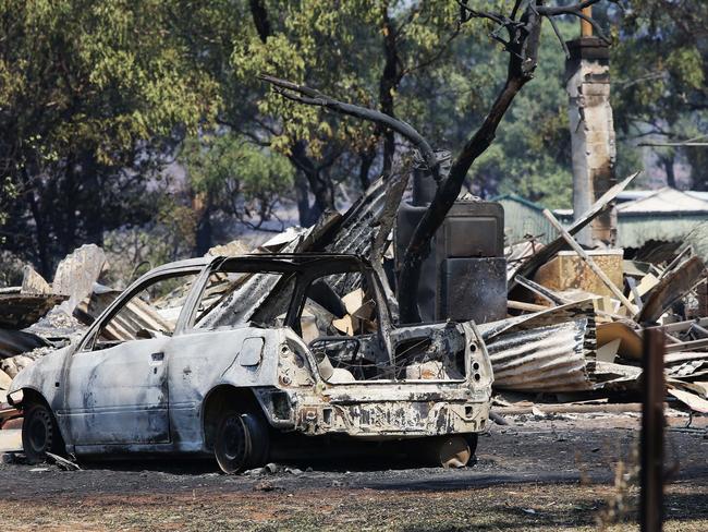 A car out the front of a house which was burned to the ground in Uarbry, east of Dunedoo. Picture: Peter Lorimer.