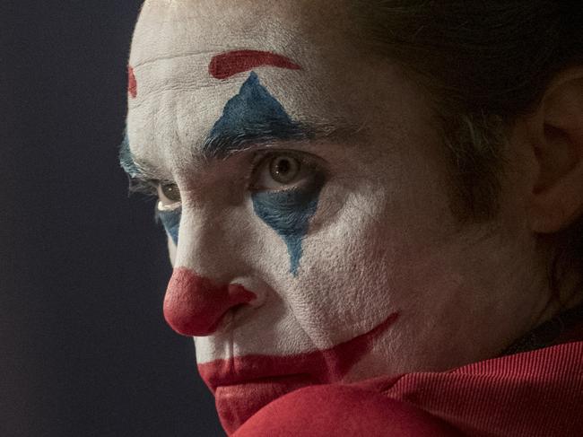 This image released by Warner Bros. Pictures shows Joaquin Phoenix in a scene from "Joker." (Niko Tavernise/Warner Bros. Pictures via AP)