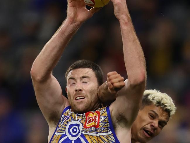 *APAC Sports Pictures of the Week - 2020, August 24* - PERTH, AUSTRALIA - AUGUST 23: Jeremy McGovern of the Eagles marks the ball against Bobby Hill of the Giants during the round 13 AFL match between the West Coast Eagles and the Greater Western Sydney Giants at Optus Stadium on August 23, 2020 in Perth, Australia. (Photo by Paul Kane/Getty Images)