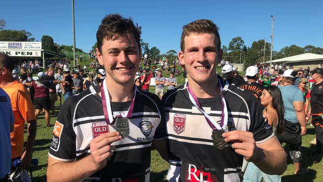 Jake Martin (L) and Ben Liyou (R) celebrate a 28-24 win in the Mal Meninga Cup.