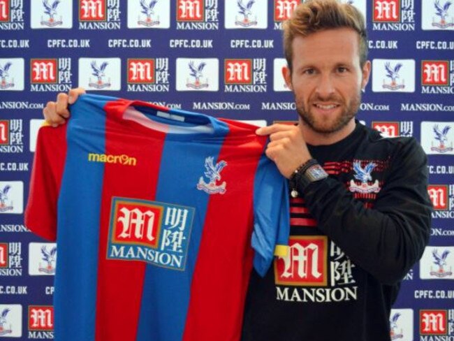 Yohan Cabaye poses with the Crystal Palace jersey after joining from Paris Saint-Germain.