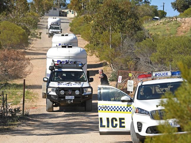 A heavy police presence at the Murray Mallee property during the search. Picture: Tom Huntley