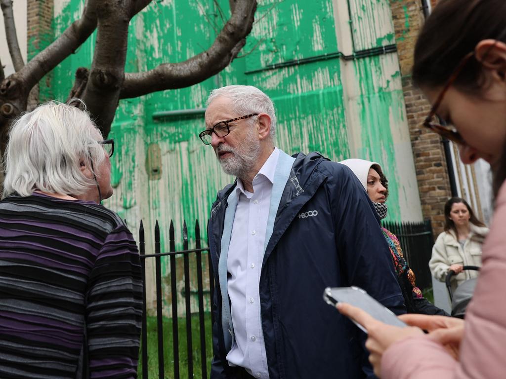 Former Labour Party leader Jeremy Corbyn, centre, chatted with other Finsbury Park locals and said that environmental politics “is about densely populated urban areas like this”. Picture Adrian Dennis/AFP