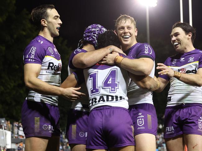 SYDNEY, AUSTRALIA - JULY 06: Sualauvi Faalogo of the Storm celebrates scoring a try during the round 18 NRL match between Wests Tigers and Melbourne Storm at Leichhardt Oval, on July 06, 2024, in Sydney, Australia. (Photo by Scott Gardiner/Getty Images)