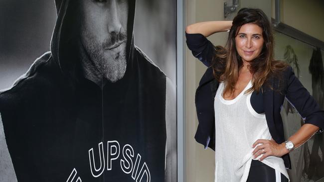Jodhi Meares poses outside a The Upside outlet in Mosman.