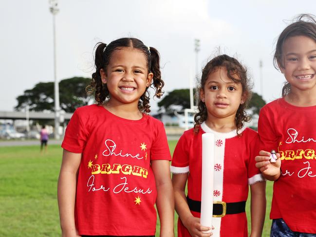 Faith Rea, Annaveah Rea and Dream Fukofuka at the Cairns Churches Joy to the World Community Carols, held at the Cairns Showgrounds. Picture: Brendan Radke