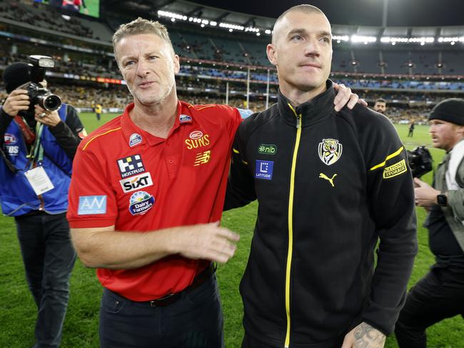 Martin and Hardwick on the MCG during Dusty’s his lap of honour. Picture: Michael Klein