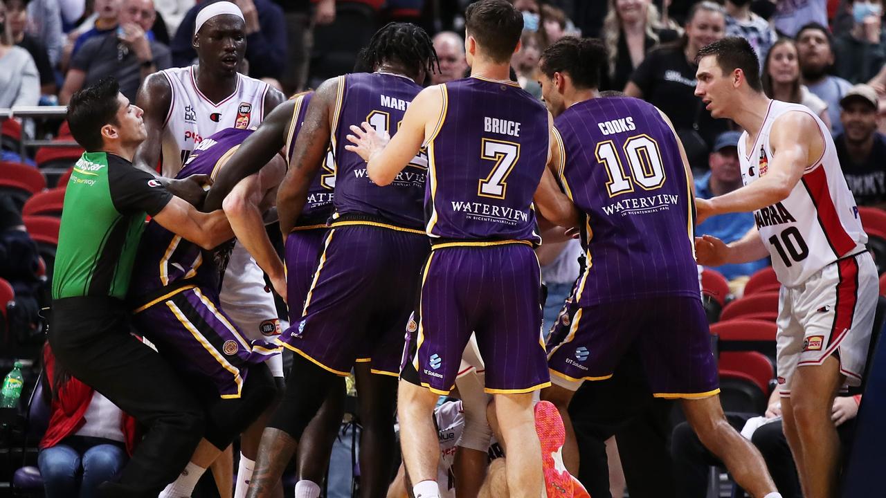 Angus Glover of the Kings and Sam Froling of the Hawks scuffle on the court. Photo: Getty Images.