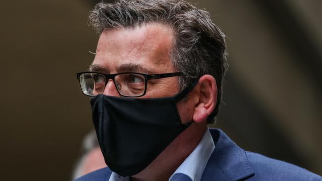 MELBOURNE, AUSTRALIA - SEPTEMBER 19: Premier of Victoria Daniel Andrews wearing a mask arrives for a Press Conference on September 19, 2021 in Melbourne, Australia. The Victorian Government has unveiled it's road map to ease restrictions once vaccinations targets are reached . (Photo by Asanka Ratnayake/Getty Images)