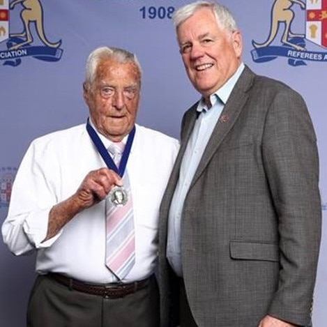 Brian Barry (left), received the Eric Cox Medal, the most prestigious award in NSW refereeing, in 2022. Picture; Supplied