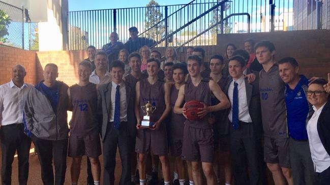 Churchie celebrate winning back-to-back GPS Basketball premierships.