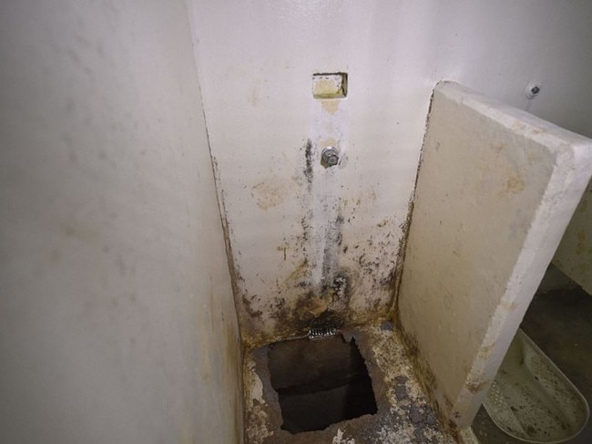 This is the 50cm-by-50cm hole at the base of El Chapo's shower that he used to escape. Picture: Supplied