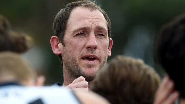 Northern Blues coach Josh Fraser talks to his players. Picture: Kylie Else