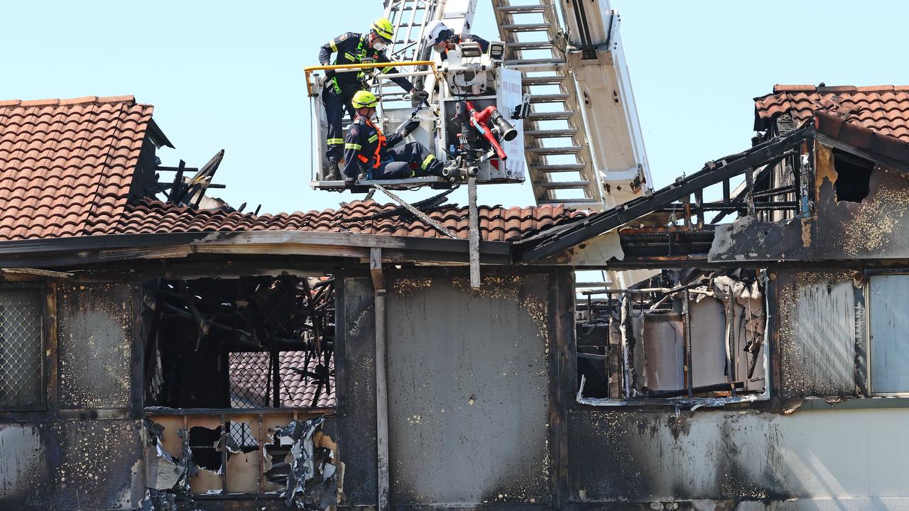 Tributes have been laid at a Thorneside unit complex, where a ferocious townhouse fire claimed the life of eight-year-old Raven Contini, and her babysitter Steph Ryan. Picture: NewsWire/Tertius Pickard