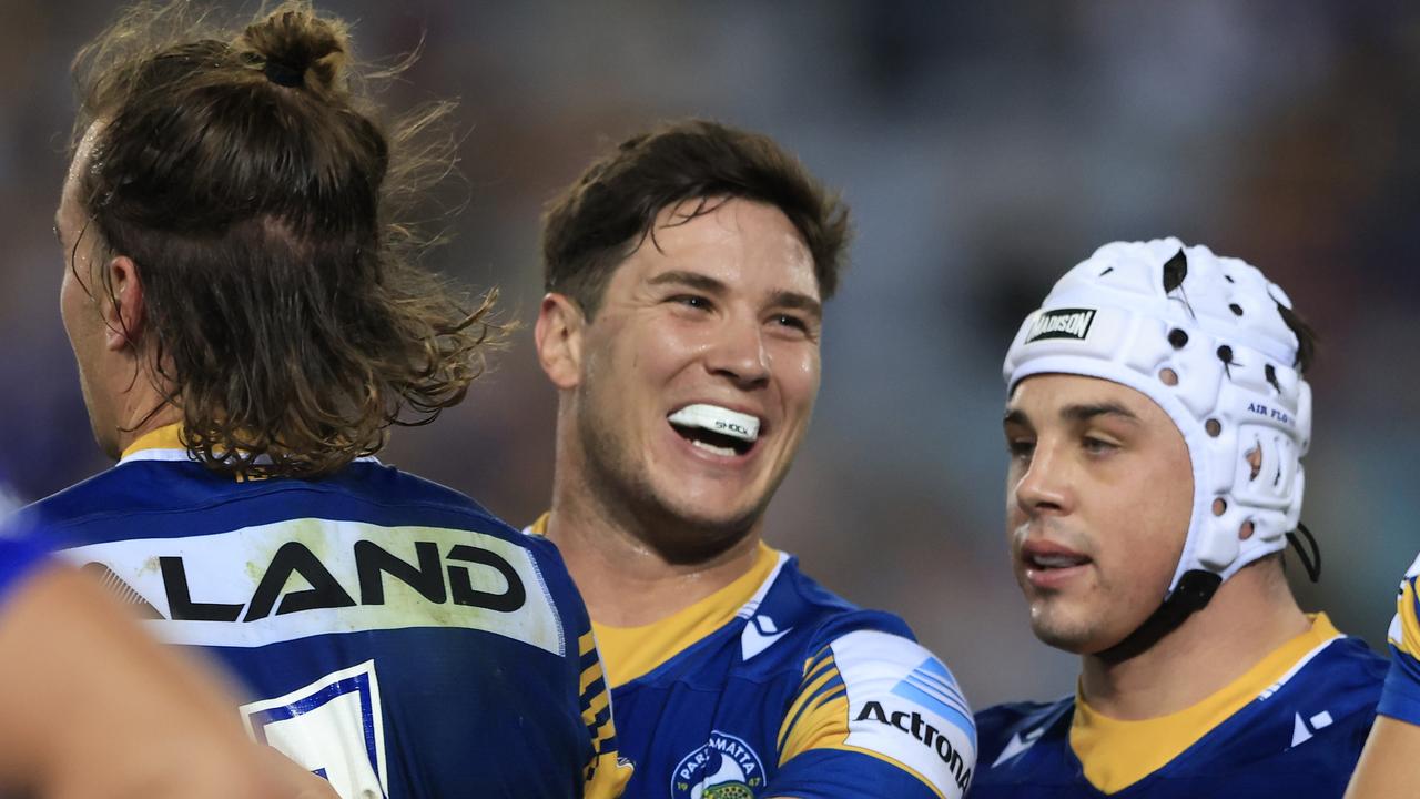 SYDNEY, AUSTRALIA - MAY 01: Mitchell Moses of the Eels celebrates a Clint Gutherson try during the round eight NRL match between the Canterbury Bulldogs and the Parramatta Eels at Stadium Australia, on May 01, 2021, in Sydney, Australia. (Photo by Mark Evans/Getty Images)