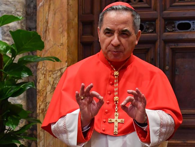 (FILES) In this file photo taken on June 28, 2018 Newly elevated cardinal, Giovanni Angelo Becciu from Italy, attends the courtesy visit of relatives following a consistory for the creation of new cardinals on June 28, 2018 in the Apostolic Palace at St Peter's basilica in Vatican. - Cardinal Angelo Becciu, the head of the vatican's saint-making office, resigned, the Vatican said in a statement on September 24, 2020. Becciu was reportedly indirectly implicated in a financial scandal involving the Vaticanâs investment in a London real estate deal. (Photo by ANDREAS SOLARO / AFP)