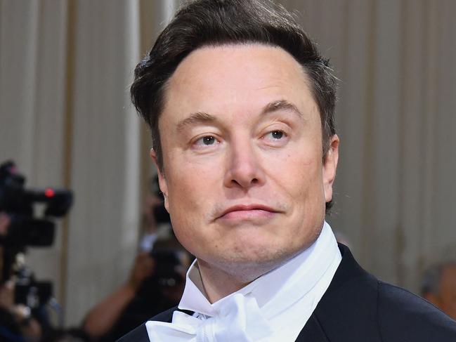 (FILES) In this file photo taken on May 02, 2022, Elon Musk arrives for the 2022 Met Gala at the Metropolitan Museum of Art in New York. - Elon Musk took control of Twitter and fired its top executives, US media reported late October 27, 2022, hours before the deadline for the billionaire to seal his on-again, off-again deal to purchase the social media network. (Photo by Angela Weiss / AFP)